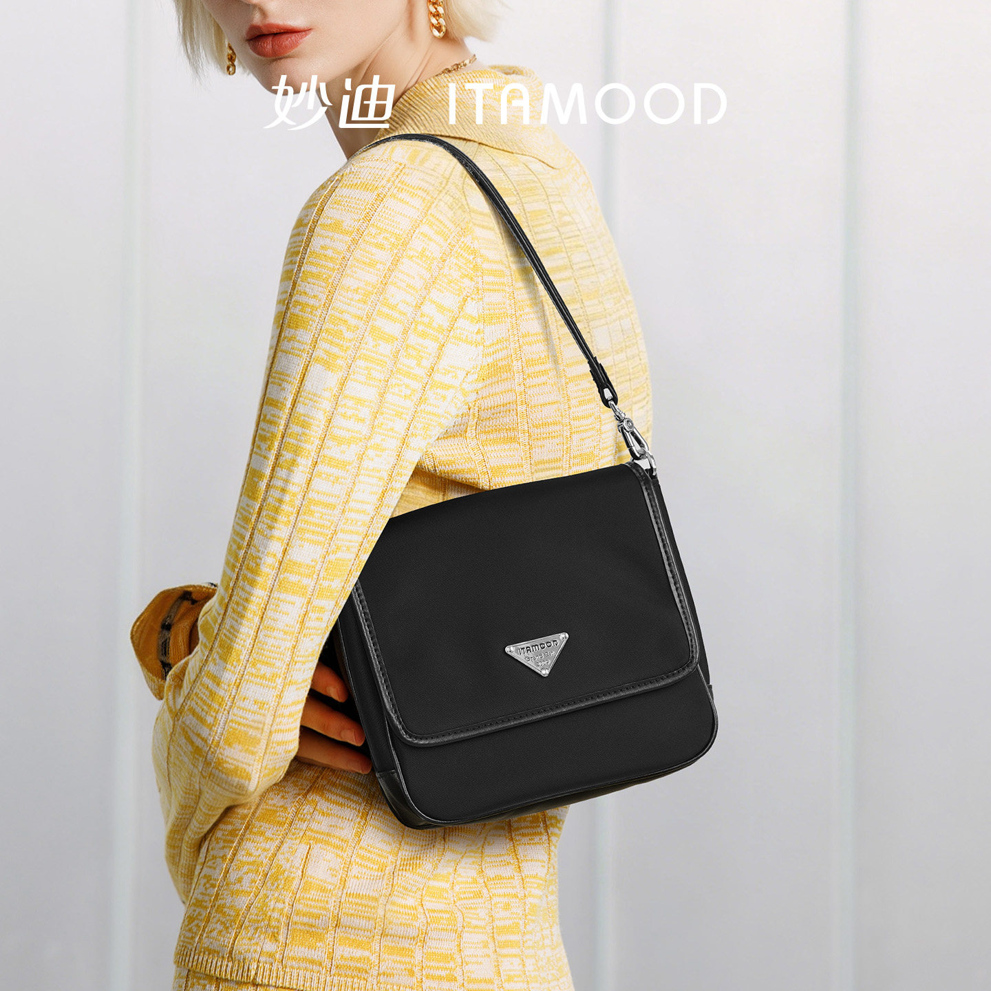 妙迪尼龙配牛皮手提袋新款黑色包包轻软时尚休闲腋下包斜挎邮差女