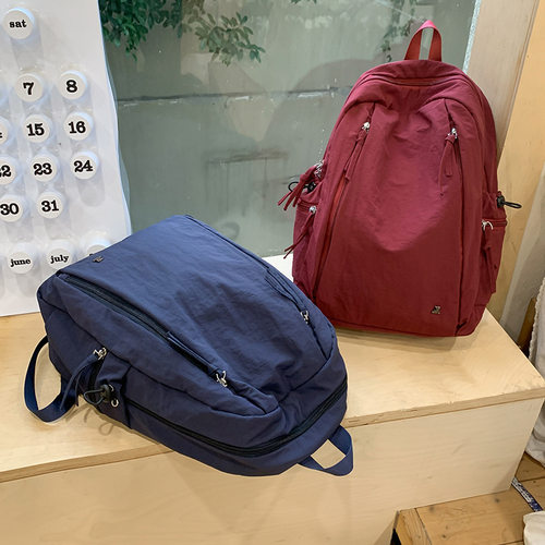 日系简约纯色双肩包女大学生轻便