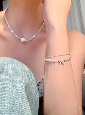 搜搜新款双层叠戴蝴蝶结手链女轻奢小众高级感珍珠手串手饰批发