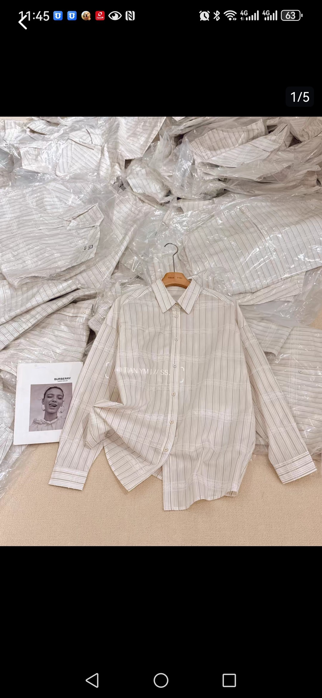欧洲站2025春新款设计感法式蕾丝拼接条纹衬衫简约休闲翻领上衣女