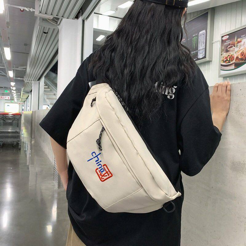 旅行包新款大容量加厚女挎包个性潮流绣花帆布单肩街头腰包男胸包