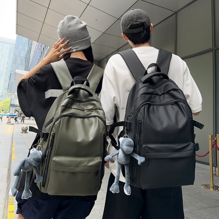 质感防水双肩包潮男初中生书包女大学生大容量骑行机车风旅行背包