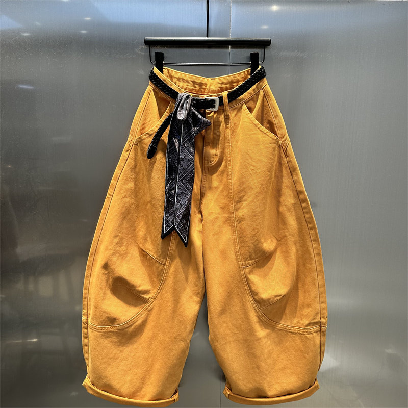 多巴胺亮橘色小众弯刀牛仔裤女2025年秋季新款时尚高街休闲阔腿裤