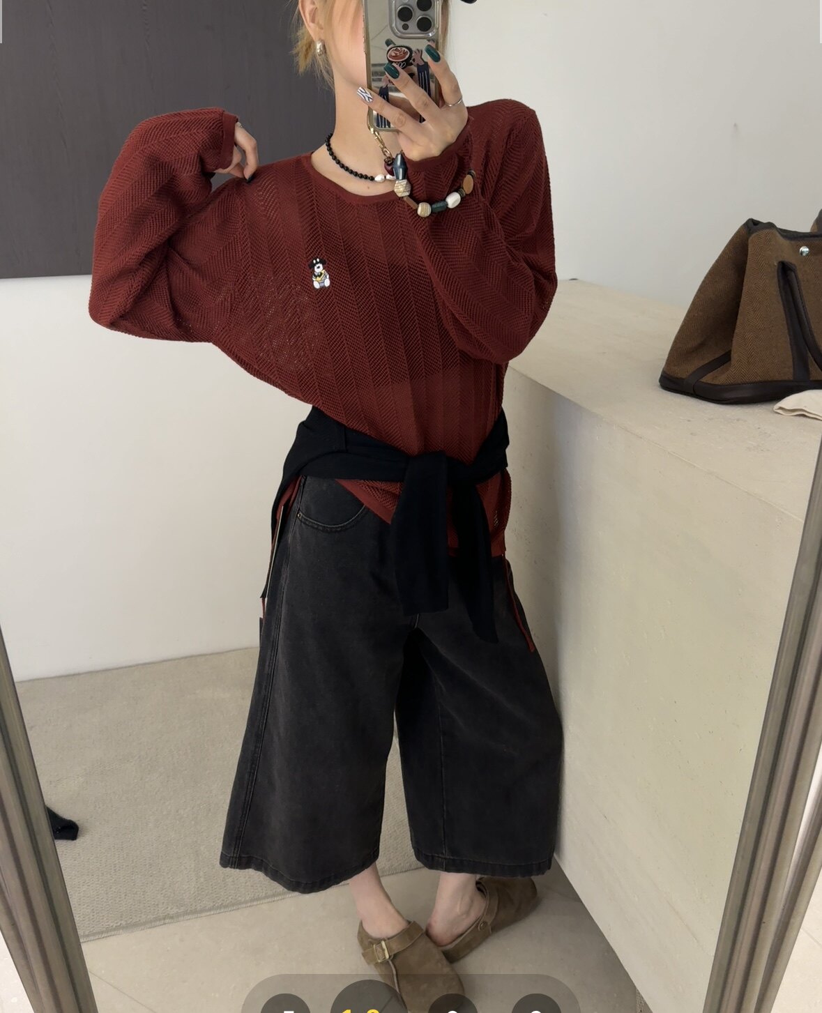 欧洲站2025早秋新款上衣女圆领套头镂空透气下抽绳长袖羊毛针织衫