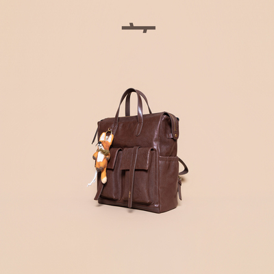 食草堂双肩包2025新款头层植鞣皮轻便旅行包双肩背包手提质感归途