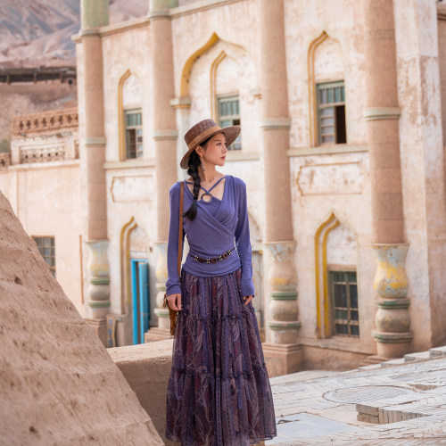 理想三旬旅行女装复古波西米亚民族风紫色上针织打底衫半身裙套装