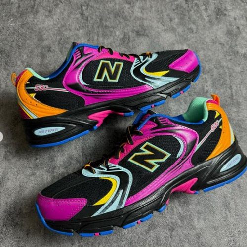 NewBalance舒适透气黑紫色跑鞋