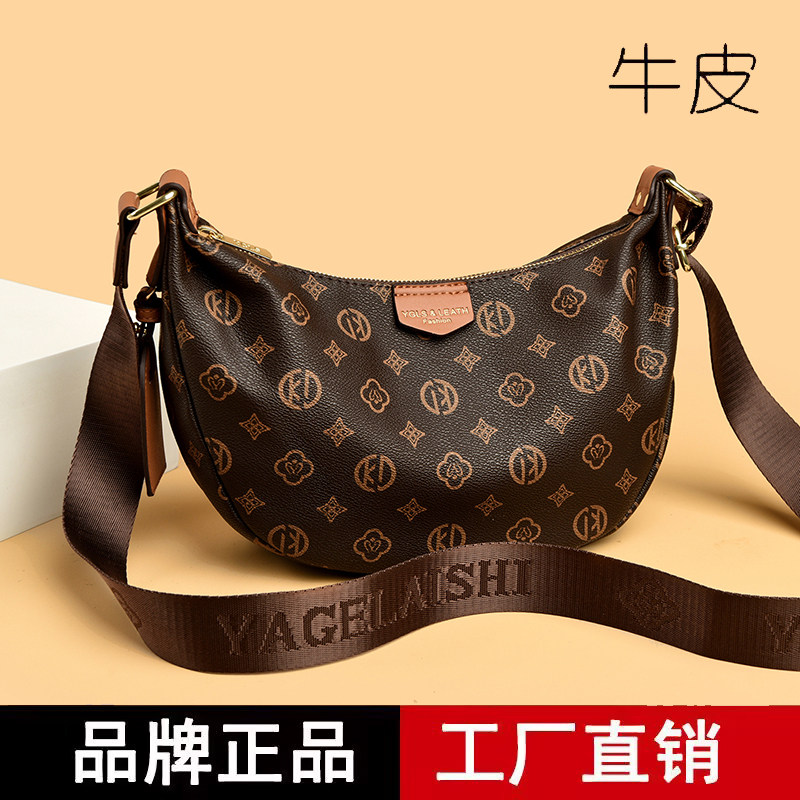 雅格莱诗真皮印花宽肩斜挎饺子包