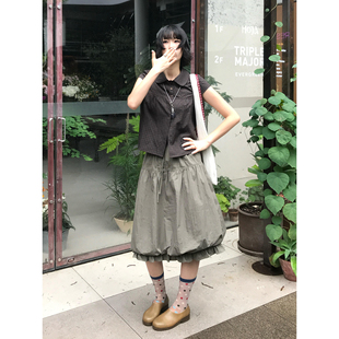 日系工装风灰绿色木耳边花苞中裙女夏季设计感通勤宽松高腰半身裙