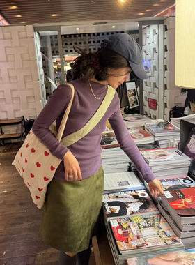 小众设计师款高级感绿色麂皮绒短裙女秋冬学生高腰不规则半身中裙