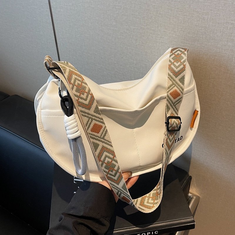 休闲尼龙包包女2025新款小众百搭单肩饺子包大容量学生通勤斜挎包,箱包皮具/热销女包/男包,通用款女包,淘宝优惠券,粉丝福利购,淘宝优惠卷