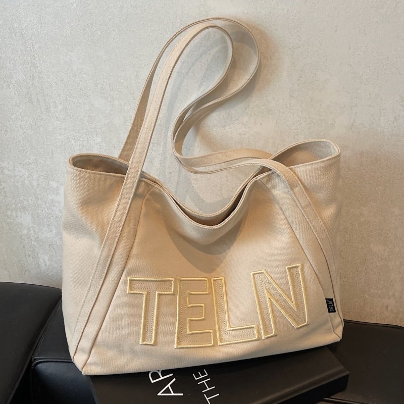 小众大容量包包女2025新款刺绣字母帆布手提袋上课通勤单肩托特包,箱包皮具/热销女包/男包,托特包,淘宝优惠券,粉丝福利购,淘宝优惠卷