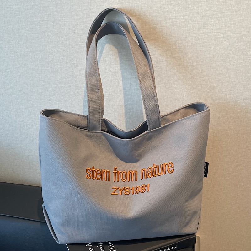 刺绣字母帆布包大容量通勤托特包