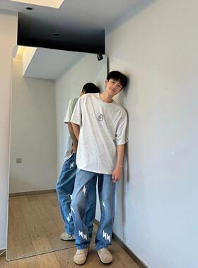 美式高街夏季贴皮闪电刺绣水洗蓝色直筒牛仔裤男女宽松轻奢长裤子