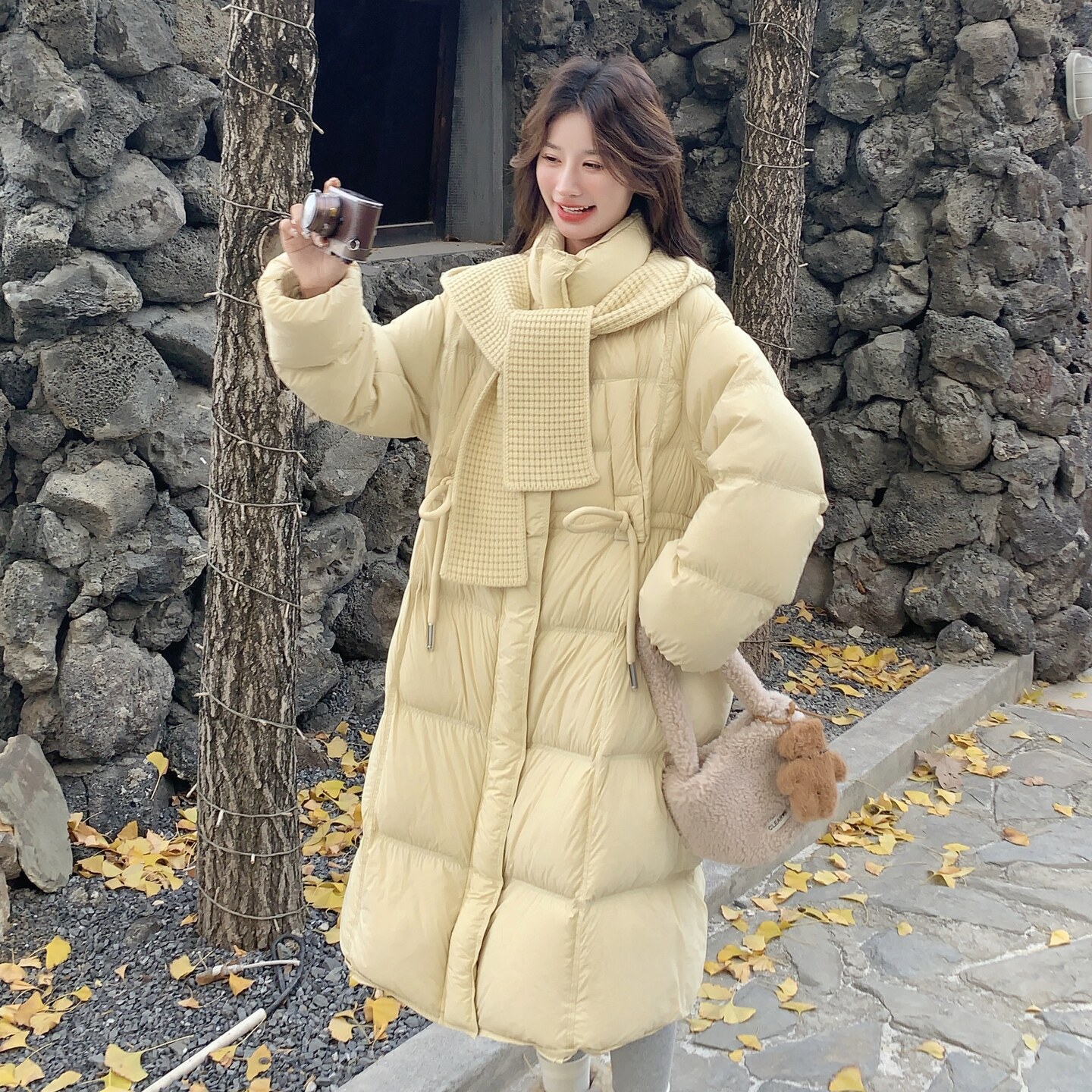 黄色韩系温柔风针织连帽羽绒服女2025冬季新款90白鸭绒长款面包服