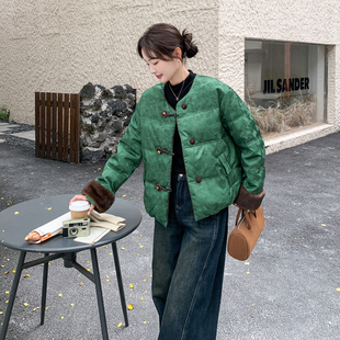 绿色高端大气上档次加厚保暖羽绒服女2025冬季新款毛绒拼接袖外套