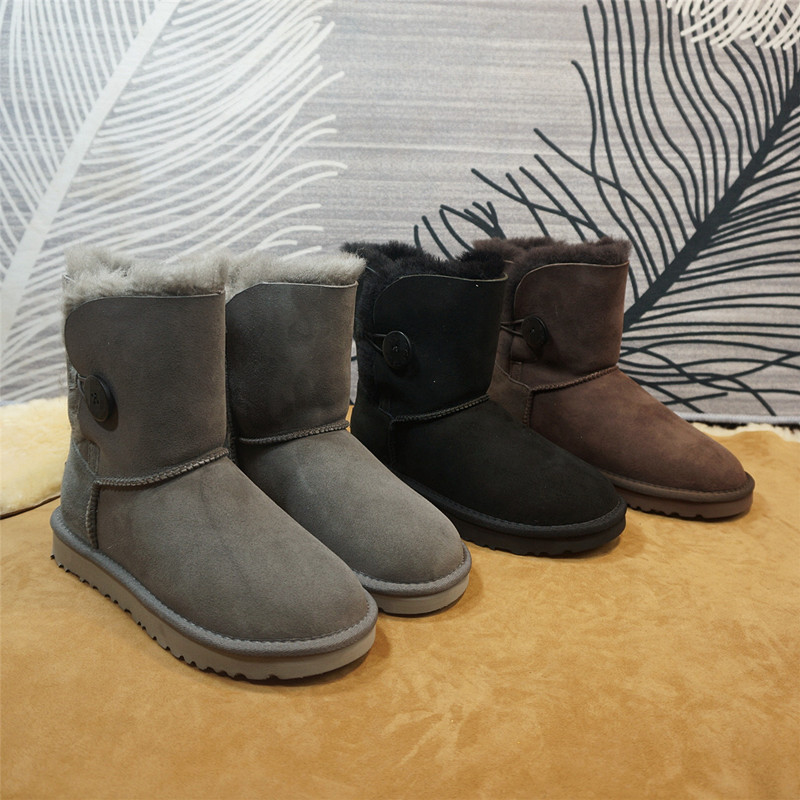 中筒靴冬季新款真皮羊皮毛一体雪地靴 一粒扣套筒保暖棉靴84-3