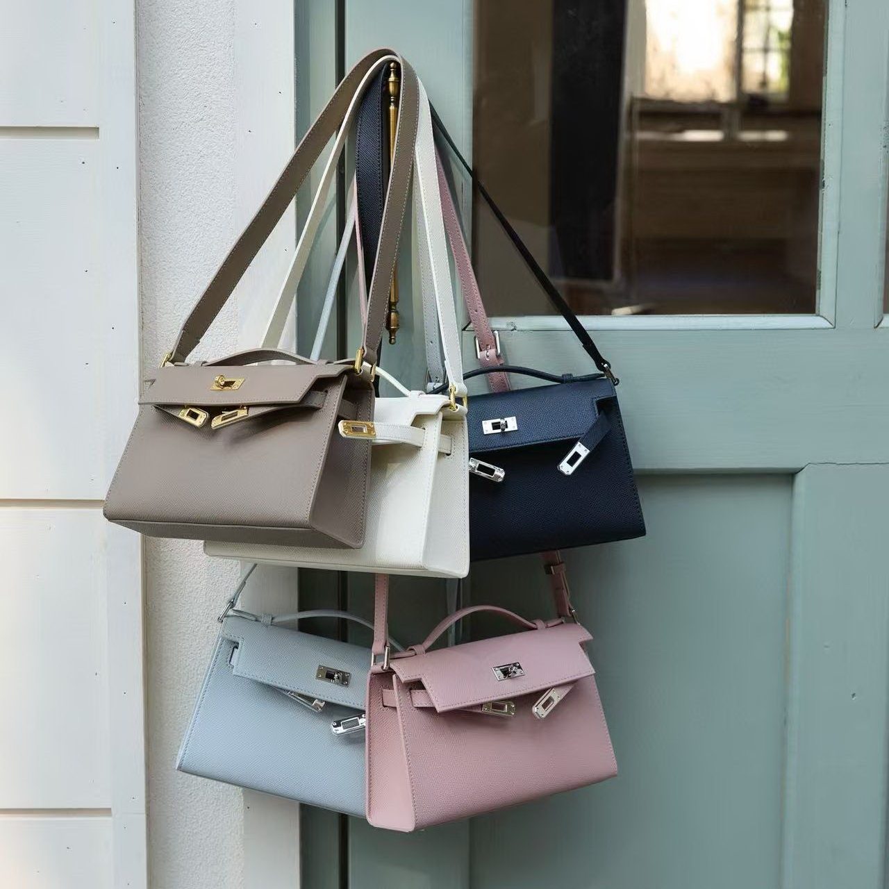 欧尚典22寸迷你真皮凯莉包女高级感手掌纹牛皮腋下包手提斜挎小包