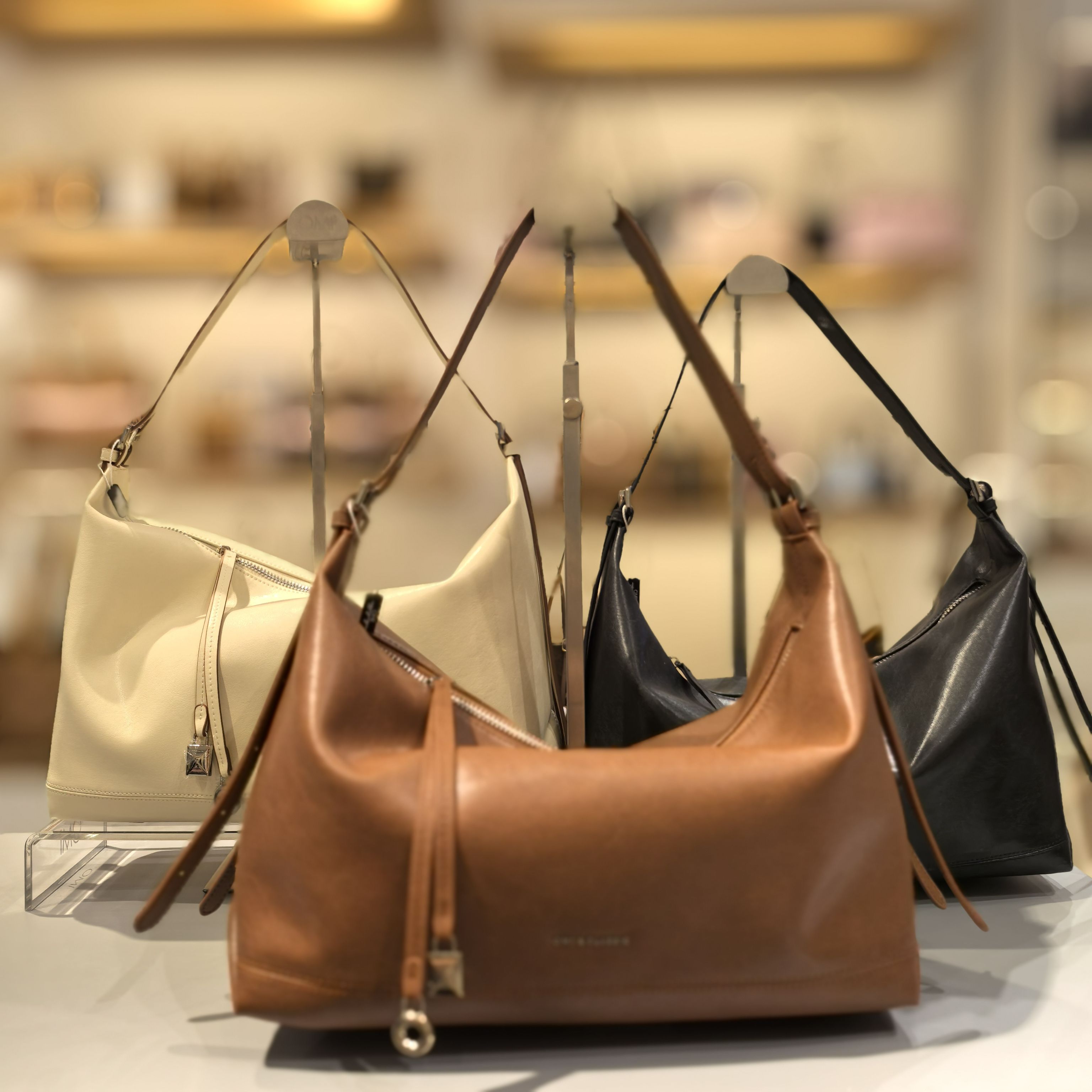 欧米OMI手提包斜挎包包女2025新款潮时尚复古饺子包单肩包