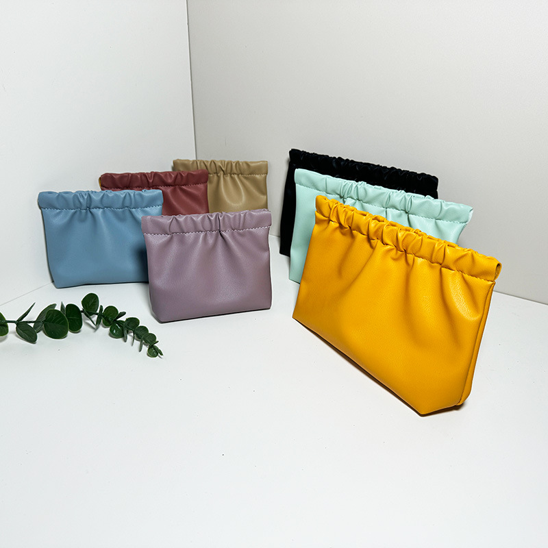 皮质化妆品收纳包简约旅行杂物弹片开口袋大容量便携式弹片袋