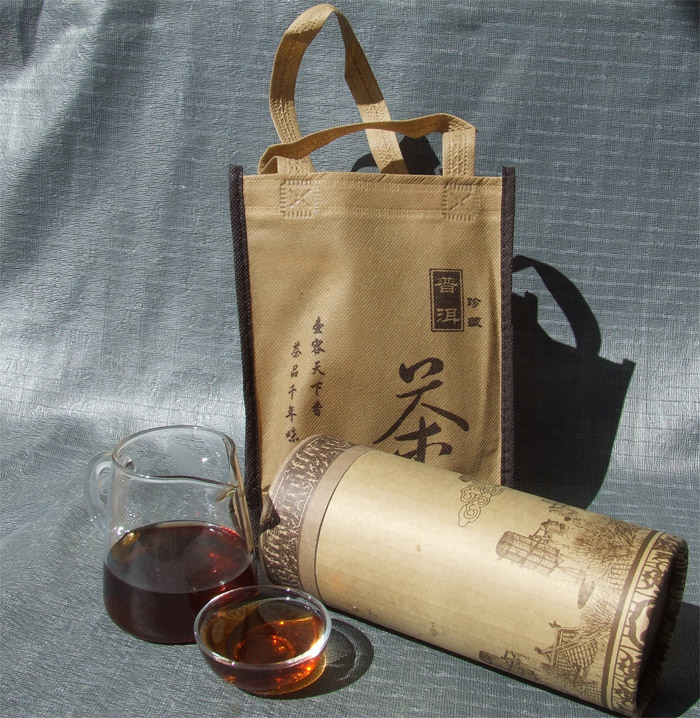 包邮2010普洱茶勐海一级熟茶普洱散茶200克送礼品茶筒-封面