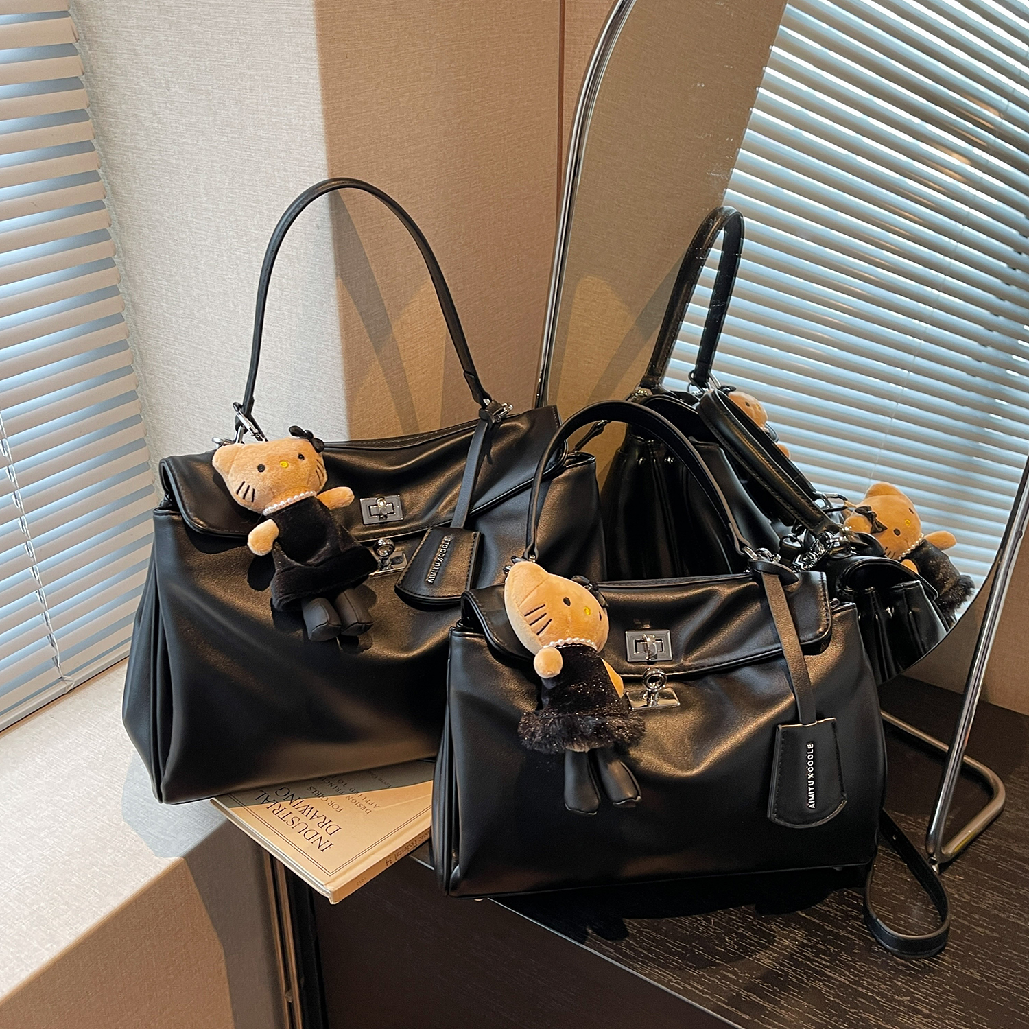 艾米兔女包2025新款时尚百搭简约日常手提通勤大容量单肩斜挎包