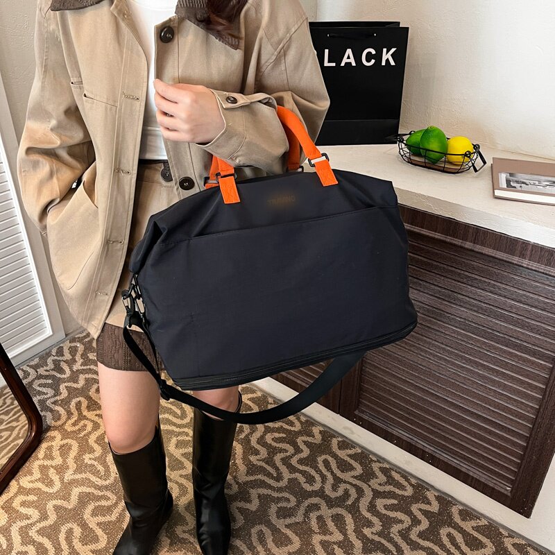 新款时尚潮流旅行袋女大容量短途手提包轻便健身包黑色休闲登机包