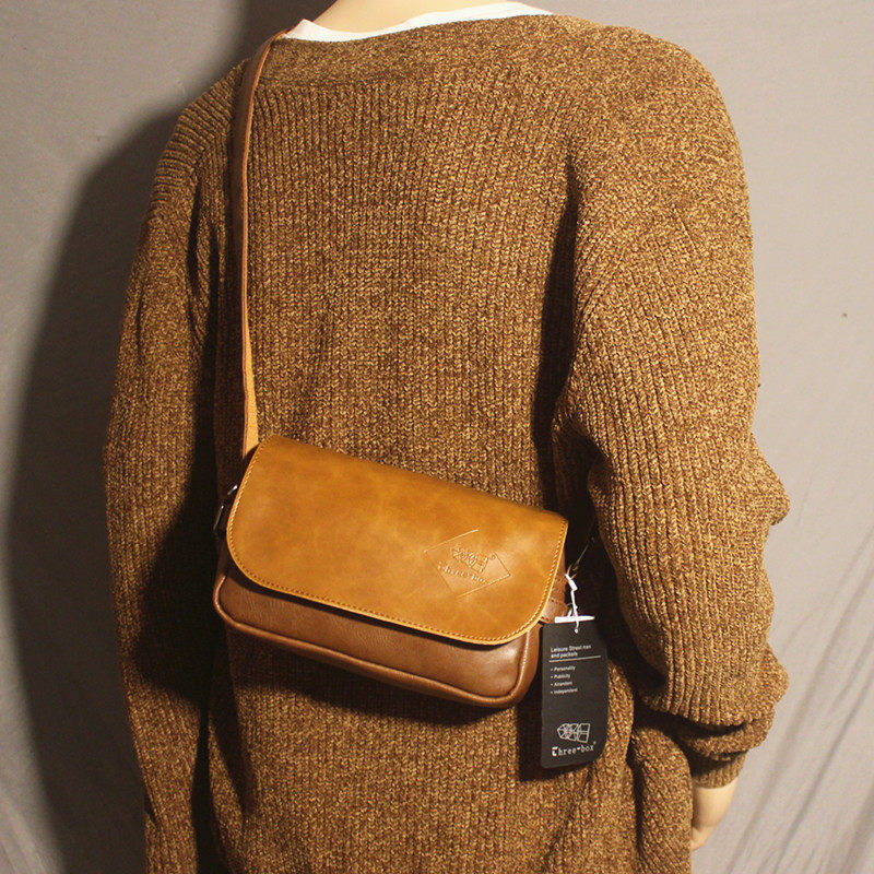 潮牌男士单肩包手机包女士小挎包