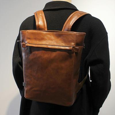 休闲男女双肩包两用男包斜挎包潮