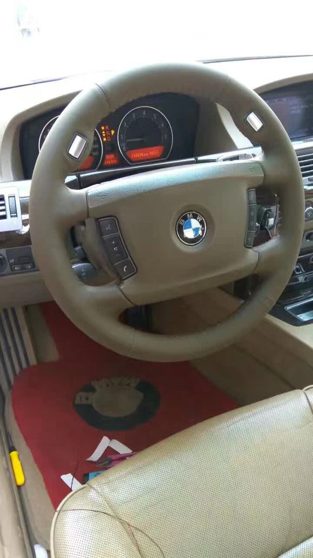 宝马7系730750740760包幅式手缝专车用把套真皮方向盘套改装包邮