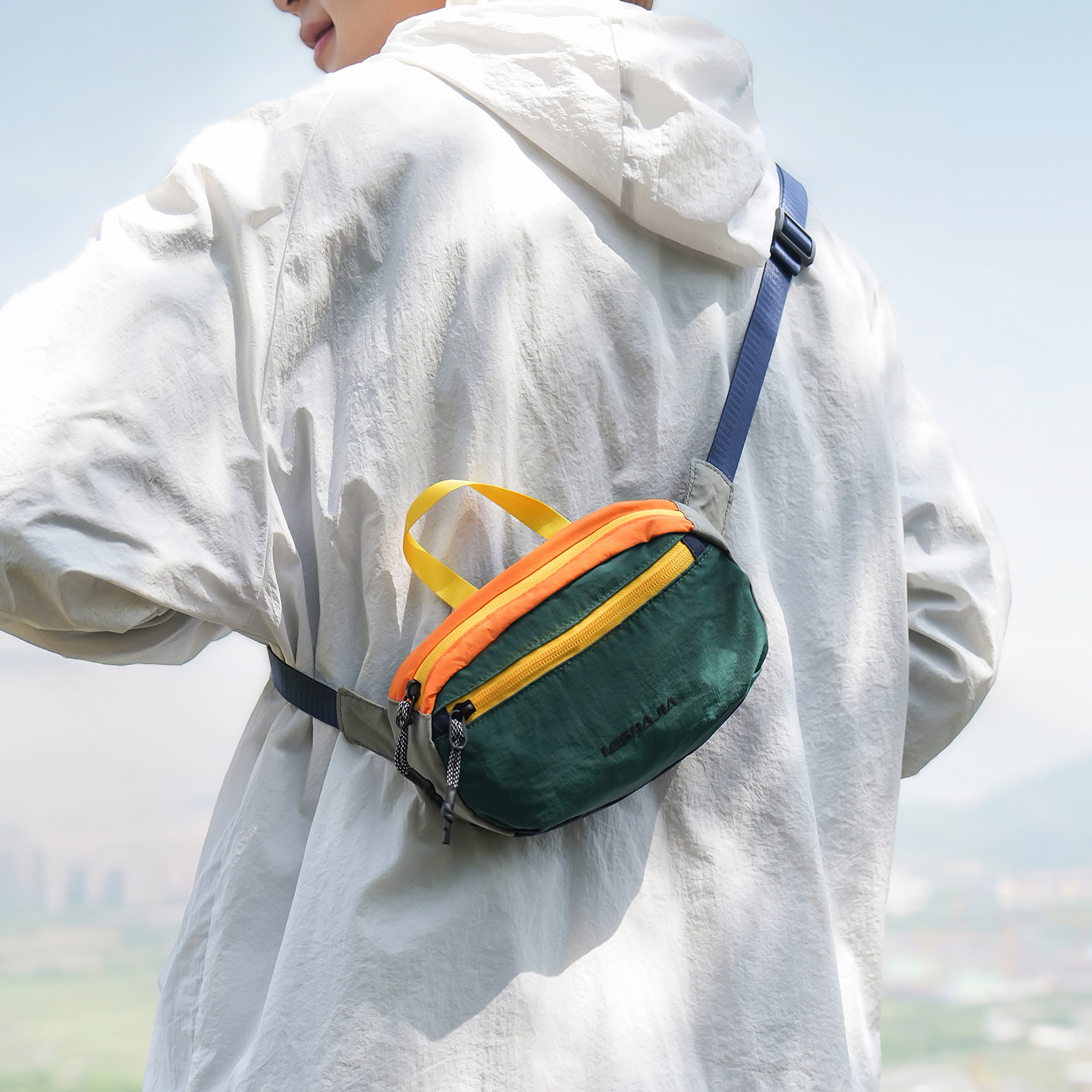 户外轻便胸包男款潮牌撞色斜挎包女运动骑行腰包外出便携休闲小包 - 实物图