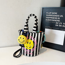 高质量条纹帆布包包女上班通勤高级感可斜挎水桶包休闲百搭手提包