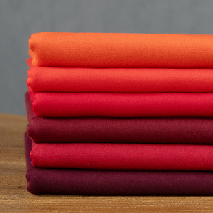 子服装 酒红色系 裙子裤 50支双面针织四面弹力 面料 锦棉罗马布料