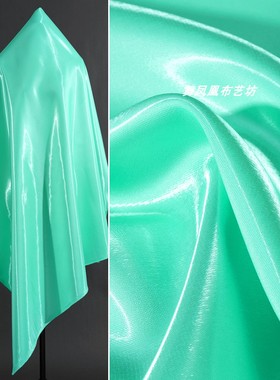 青绿色 高亮液态水光缎面料 时尚晚礼服连衣裙丝滑反光仿真丝面料