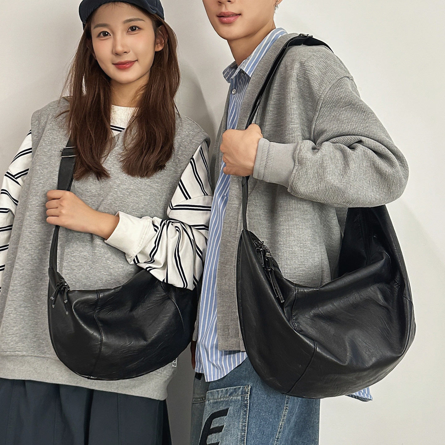 潮酷复古pu皮软皮斜挎包男时尚黑色大容量牛角包高级感女生单肩包