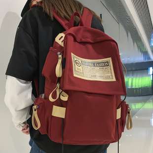 港风个性大容量背包女韩版ins风复古大学生双肩包初中学生书包男