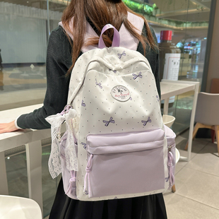 小众高颜值紫色撞色书包女小学生蝴蝶结印花双肩包初中生高中背包