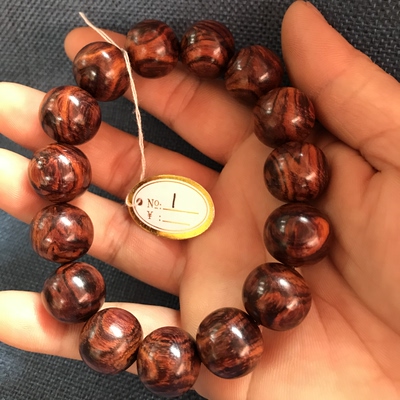 海南黄花梨毛阳野生山料正芯材鬼脸对眼1.5手串