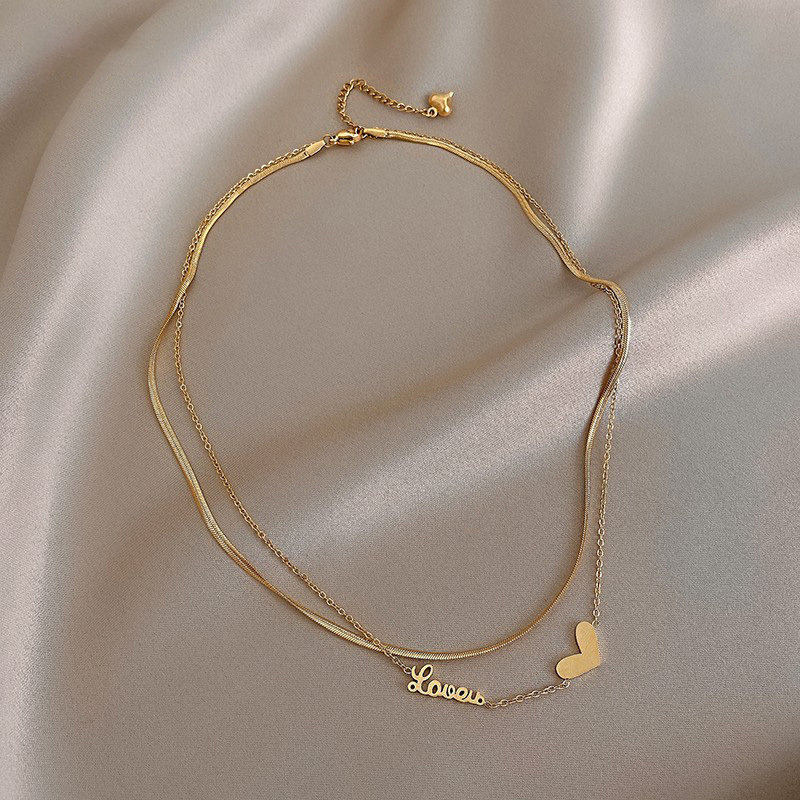 Doro朵兰の桃心双层叠戴项链女夏2025年新款淡风锁骨颈链轻奢气质