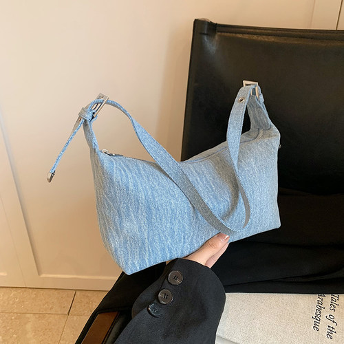 菇八八牛仔布饺子包包女