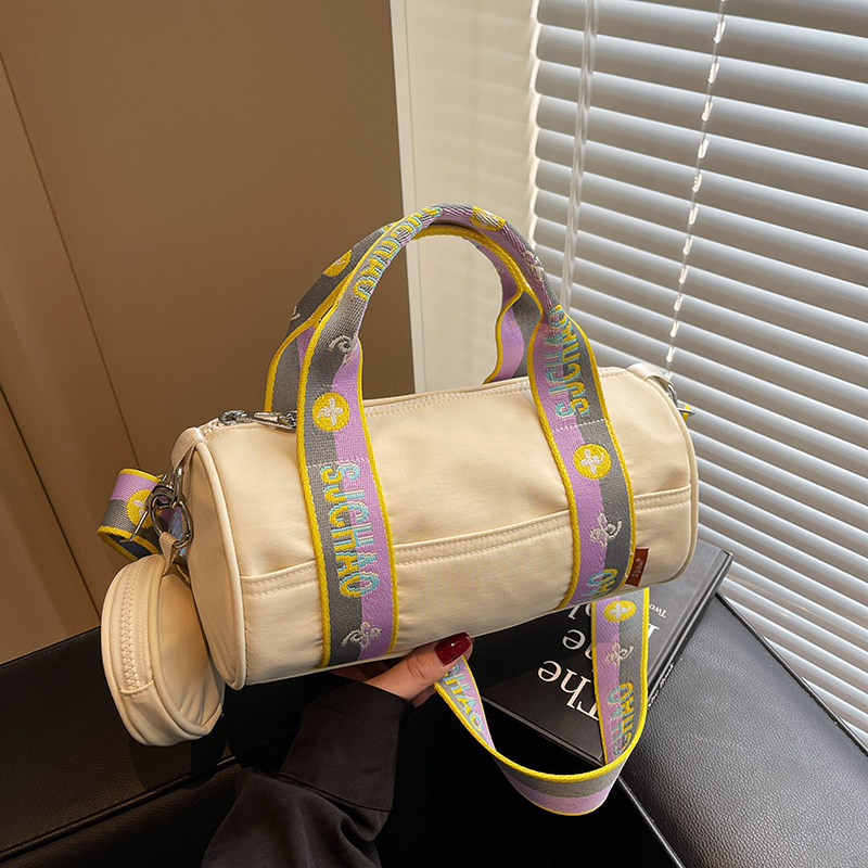 休闲圆筒帆布包包女2026新款小众感百搭手提包收纳通勤单肩斜挎包