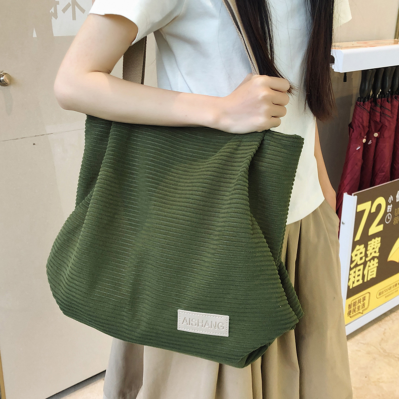 松弛感包包女2025新款大容量百搭帆布袋单肩包大学生上课托特包潮