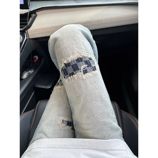 cleanfit水洗拼接假破洞牛仔裤男痞帅微喇裤腰果花设计感弯刀裤子