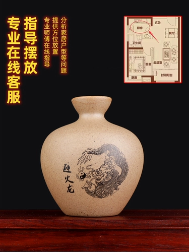 Избегание керамического резервуара для бутылки с огненным драконом решайте кухню в северо -западном углу гончарных резервуаров.