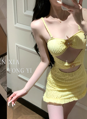 2026新款泰式辣妹黄色性感镂空吊带连体泳衣女收腰显瘦度假风泳装