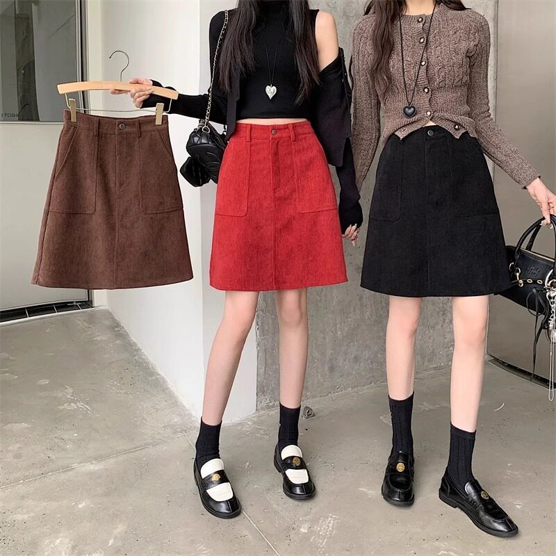灯芯绒半身裙遮胯a字裙口袋条绒