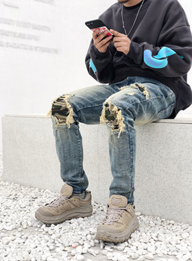 AKAMA欧美BIKER高街kanye破洞膝盖迷彩补丁拼料修身小脚牛仔裤男
