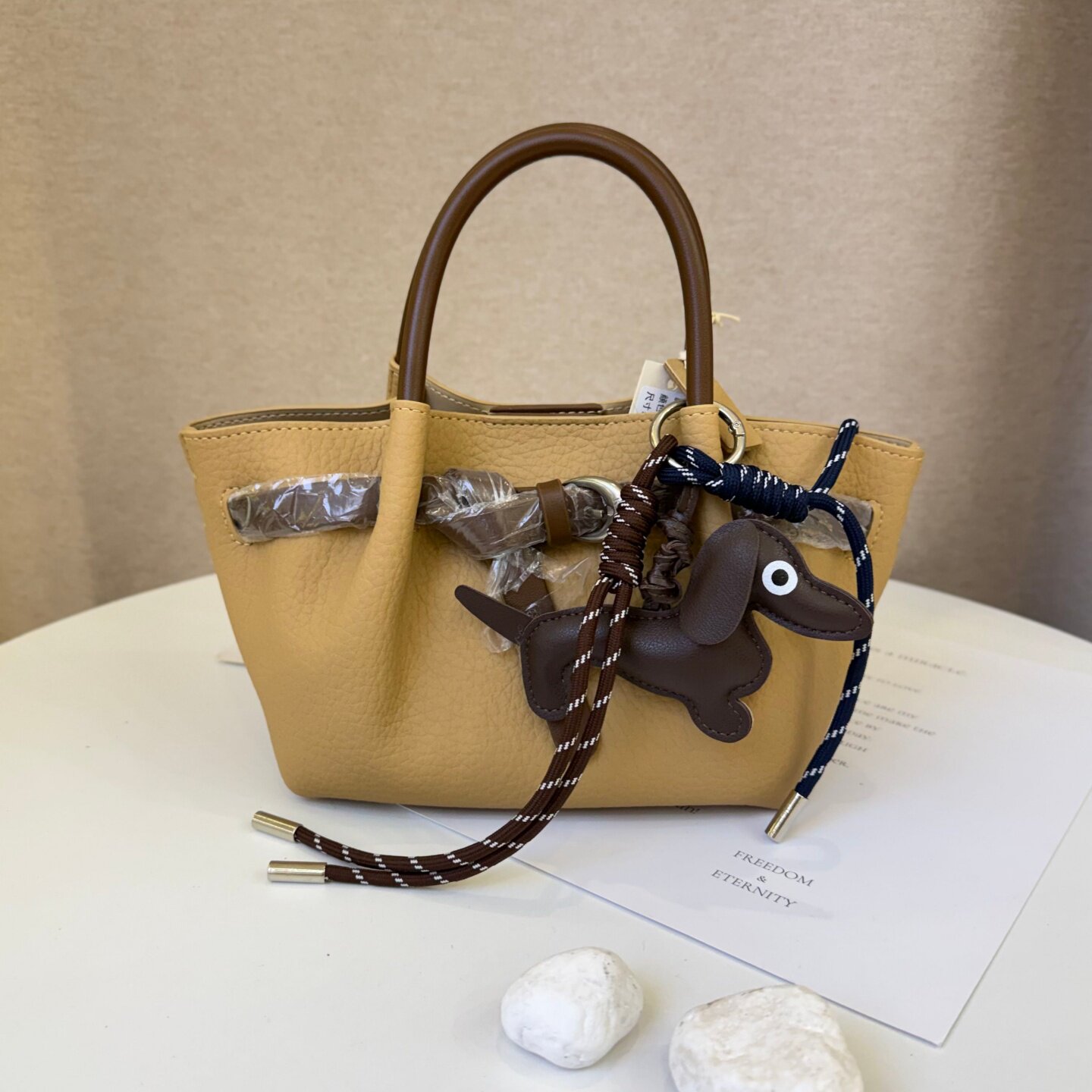 可彼娜韩系小众简约时尚撞色皮带扣手提包2026新百搭菜篮子斜挎包