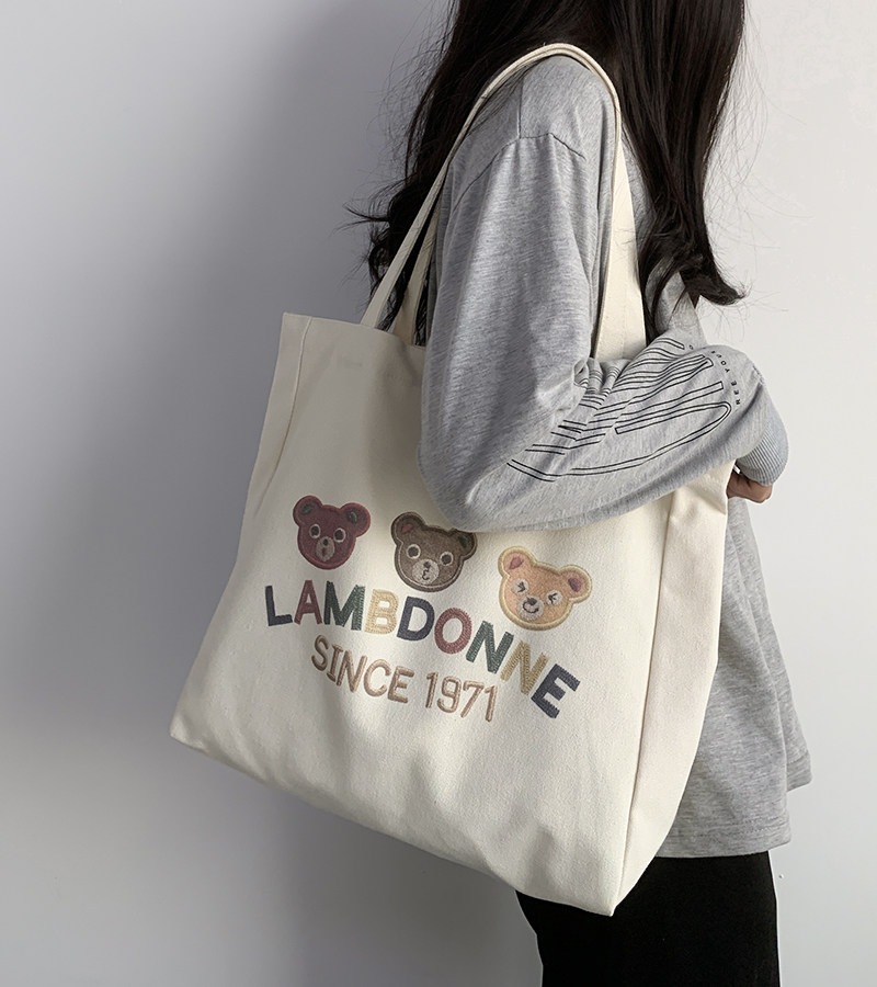 旅行帆布包女单肩通勤大容量学生上课书包ins文艺学院手提妈咪包