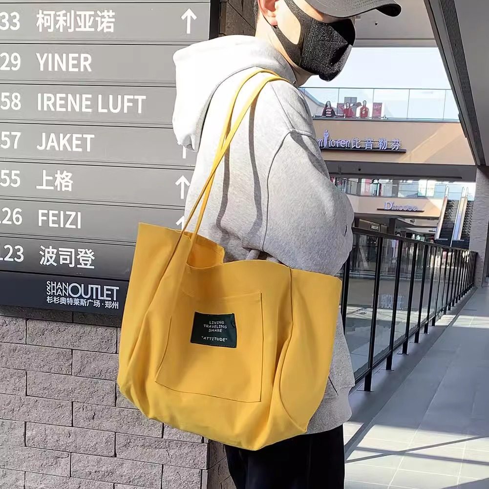 帆布包韩系慵懒风男女通用勤大容量学生单肩结实大号小众手提包袋